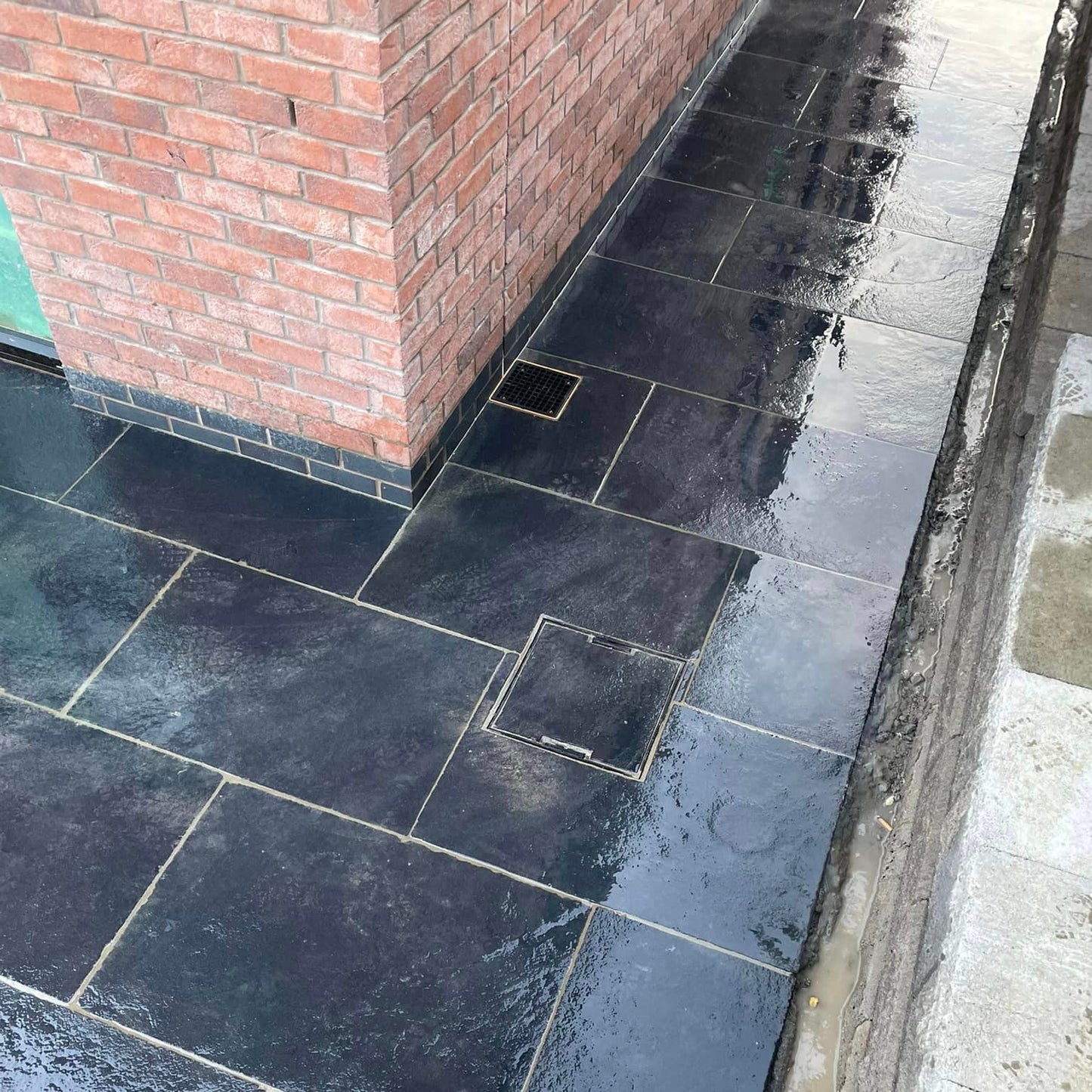 Pathway featuring Black Limestone Paving in 900 x 600mm
