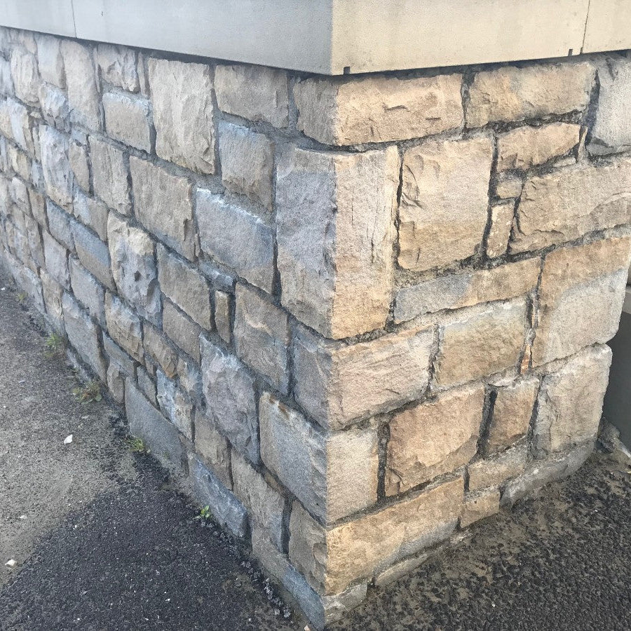Boundary wall in Blue Centre Sandstone Machined walling stone.