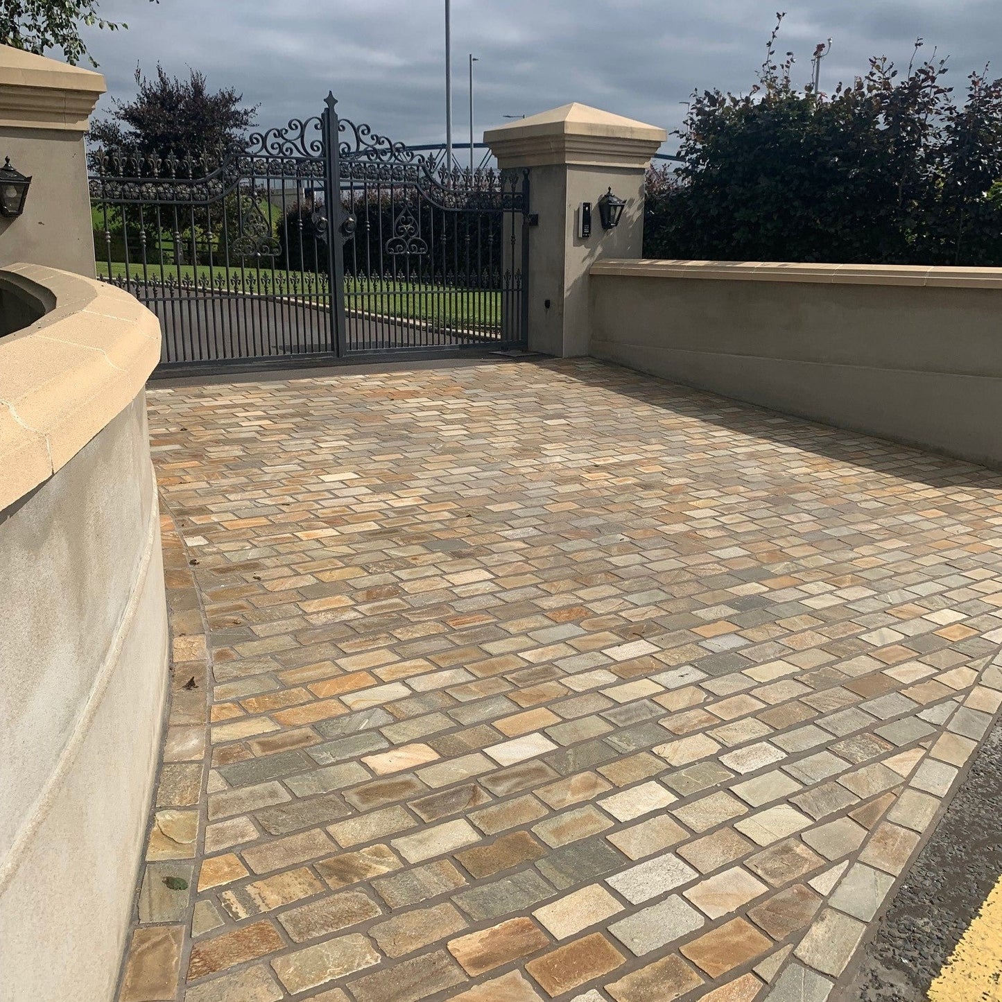Driveway entrance completed using Donegal Quartzite Cobbles in 200 x 100mm size.
