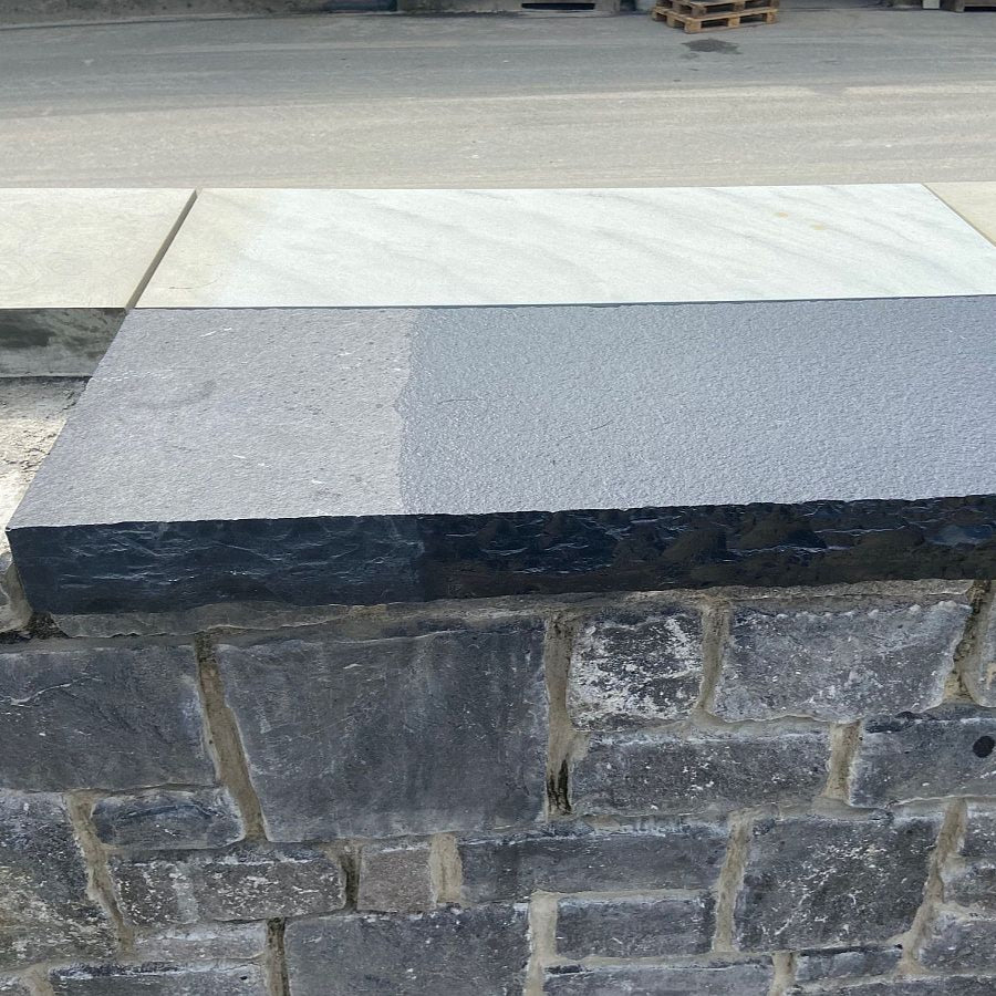 Black Limestone Wall Capping half with PROTECTiT Colour Restorer and left half without.