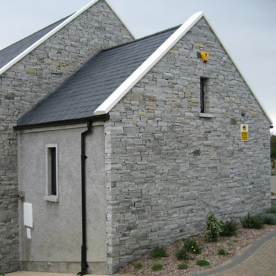 House façade completed in Silver Donegal Quartzite Machined