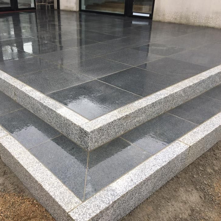 Patio edging completed using Silver Granite Kerbing with a blasted finish.