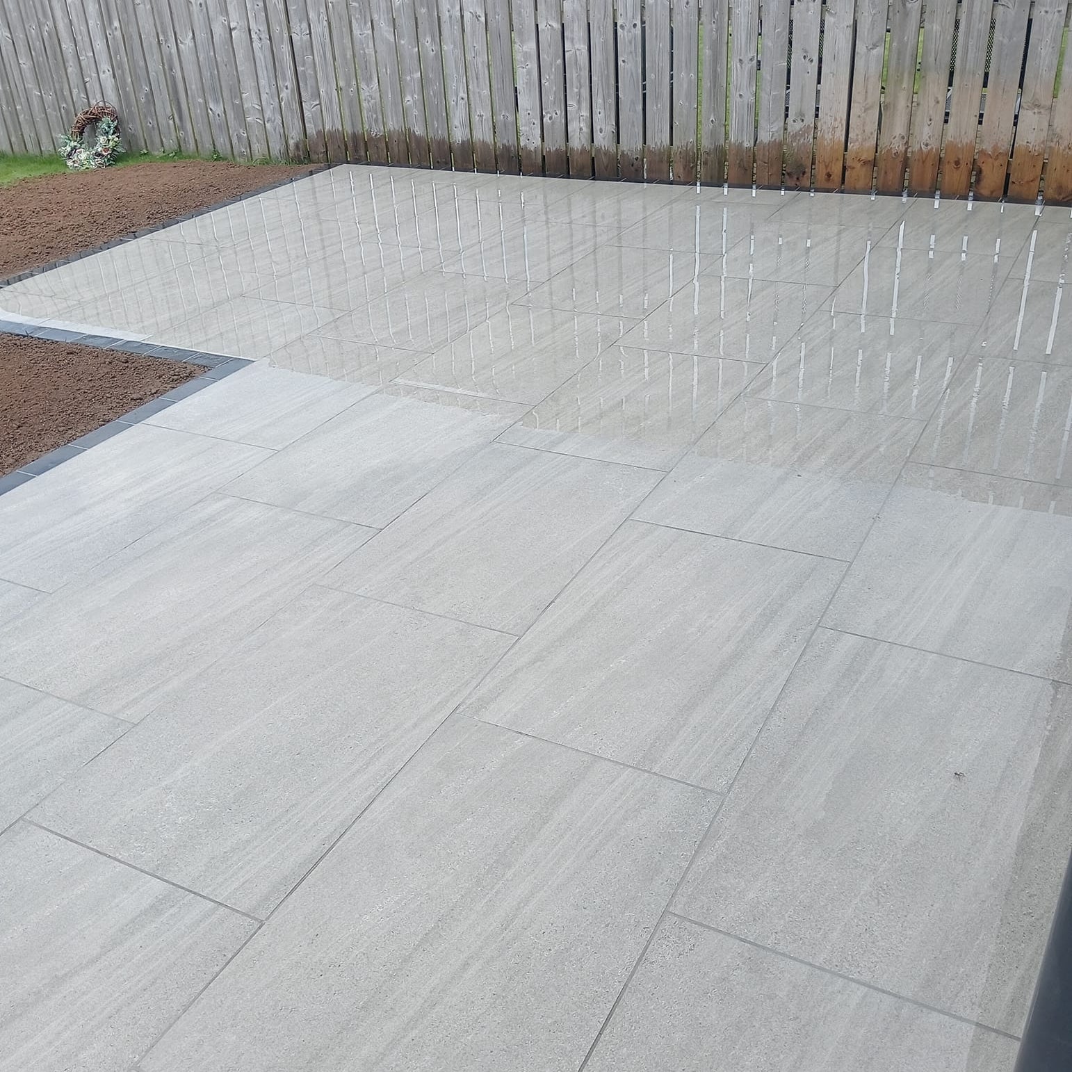 Patio area completed using Ashen Jewel Range Porcelain Paving Tiles. 