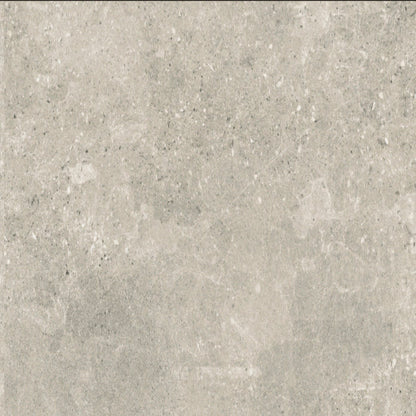 Close-up of street beige porcelain paving tile. 