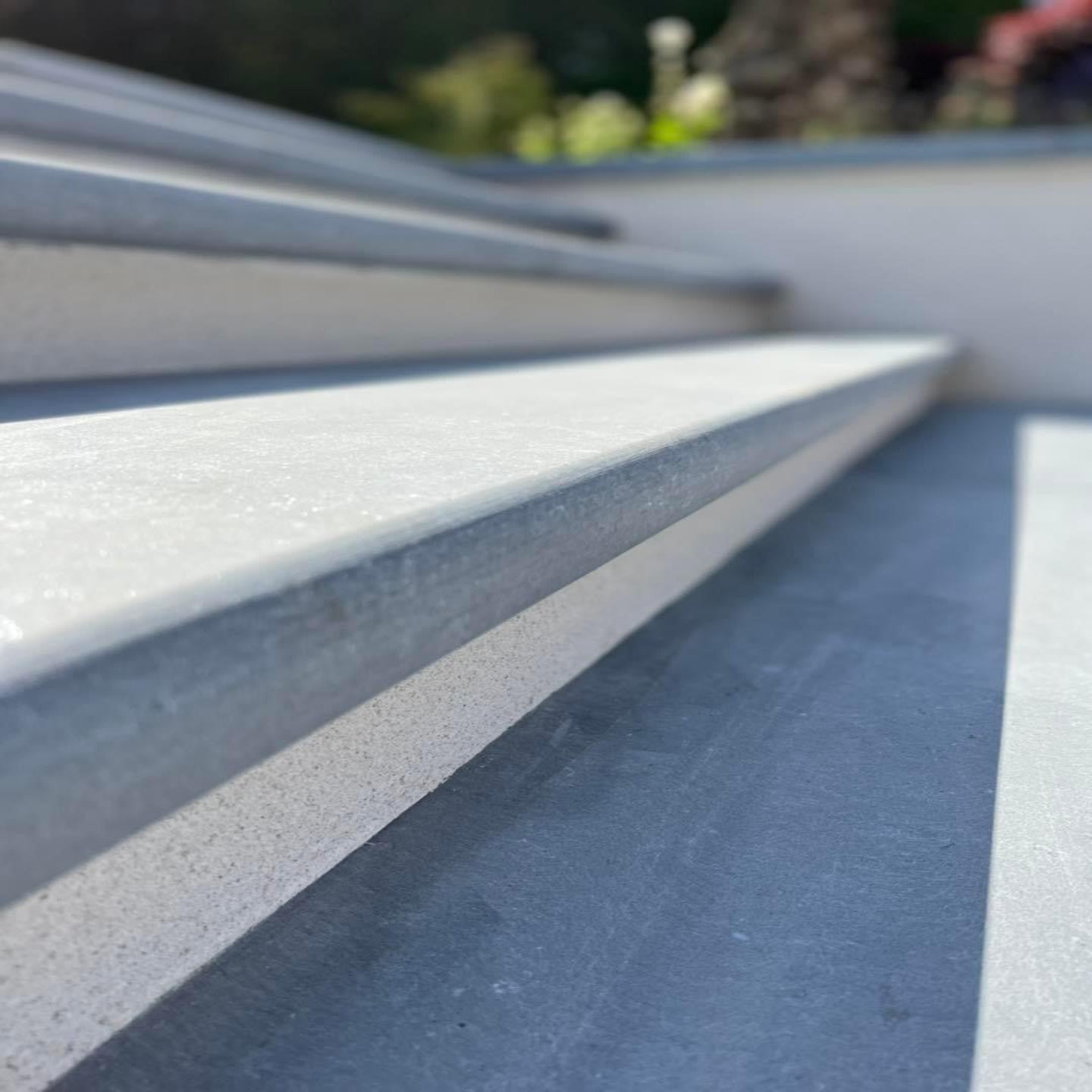 A close up of bespoke Blue Limestone Steps.
