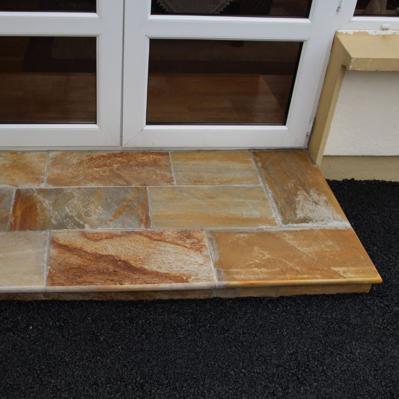 Bespoke Donegal Quartzite Steps at conservatory doors.