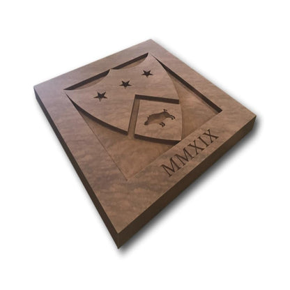 Bespoke pink sandstone plaque of  logo with roman numerals