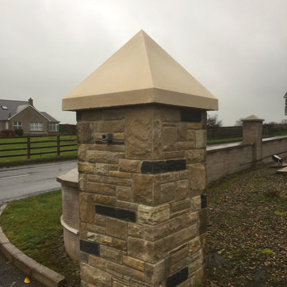 Stone pillar with bespoke sandstone pillar cap. 