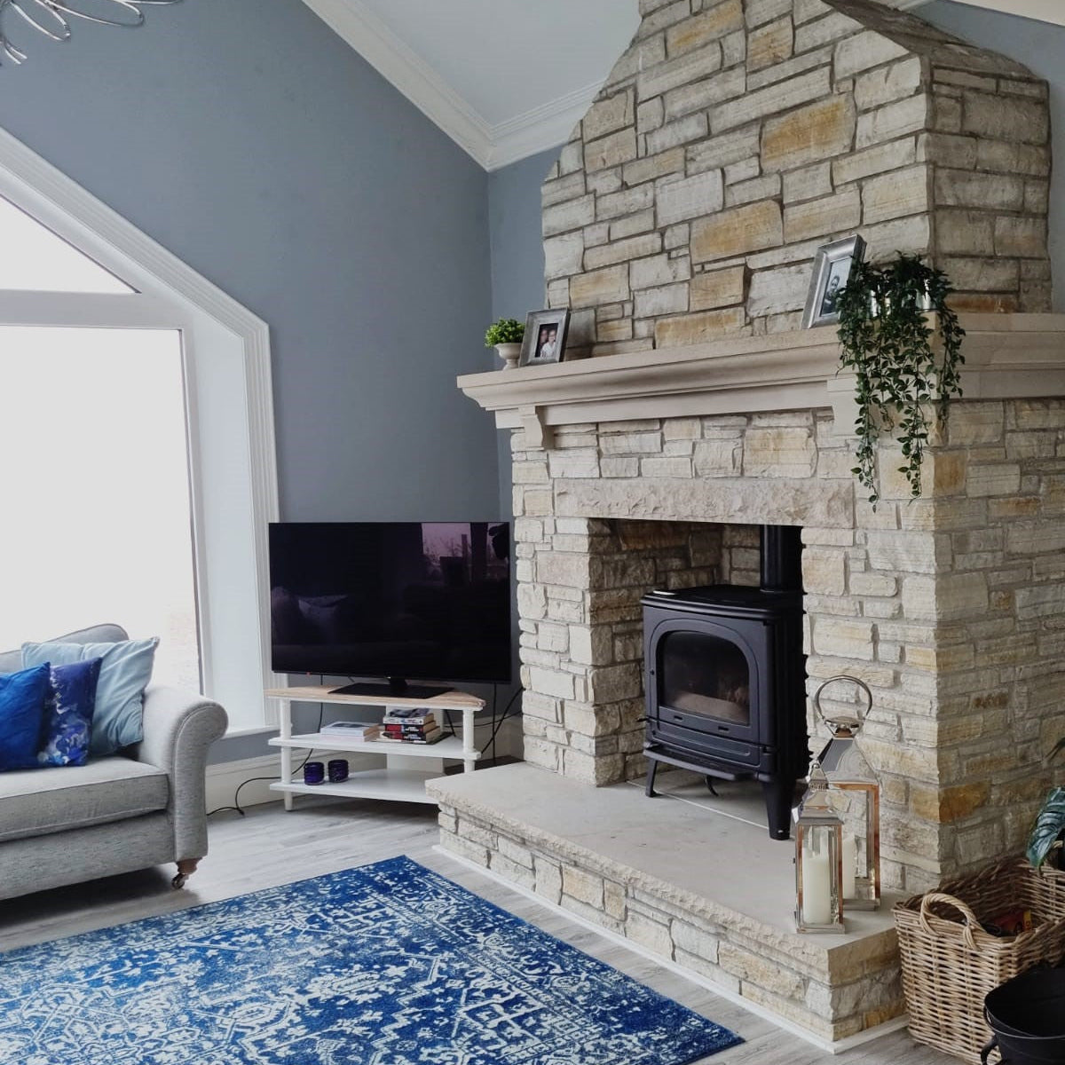 Bespoke Sandstone Hearth and Mantel on a Gold Donegal Quartzite Fireplace. 