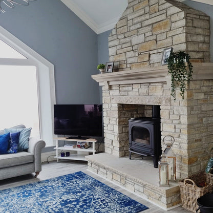 Bespoke Sandstone Hearth and Mantel on a Gold Donegal Quartzite Fireplace. 