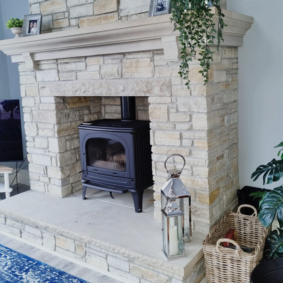 Bespoke Sandstone Hearth and Mantel on a Gold Donegal Quartzite Fireplace. 