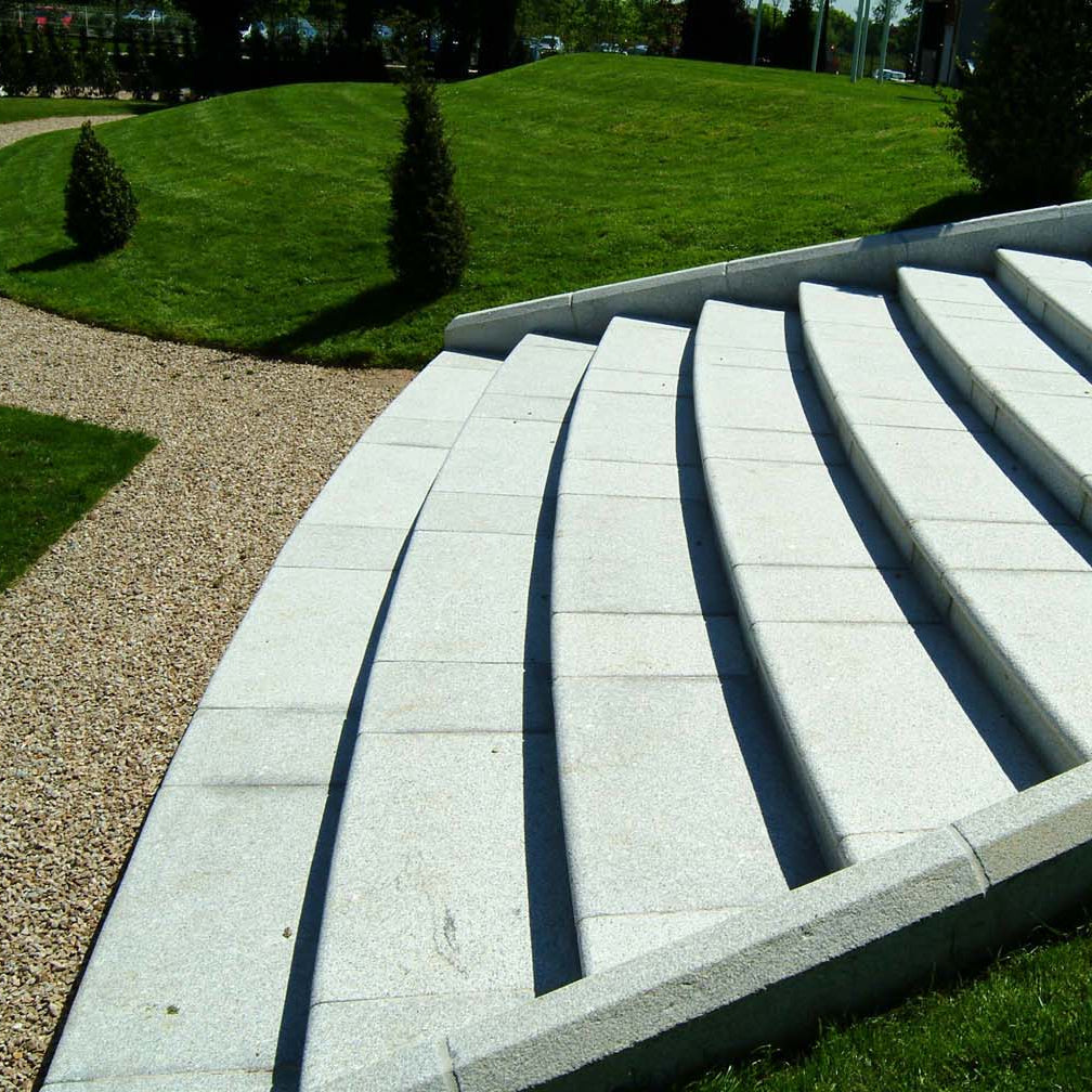 Bespoke Silver Granite Steps leading down to a park pathway.
