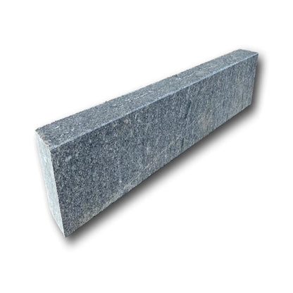 A single Black Granite Kerb with a flamed finish, meaning the stone has a textured, semi-rough surface.