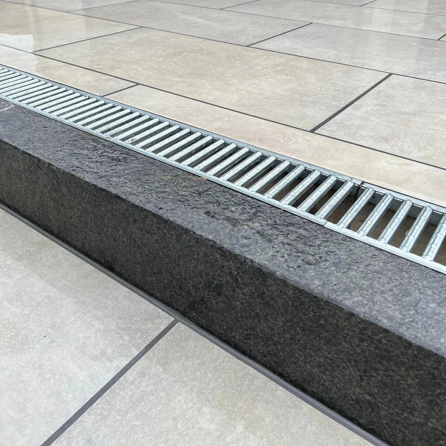 Close up of Black Granite Kerb with a flamed finish. 