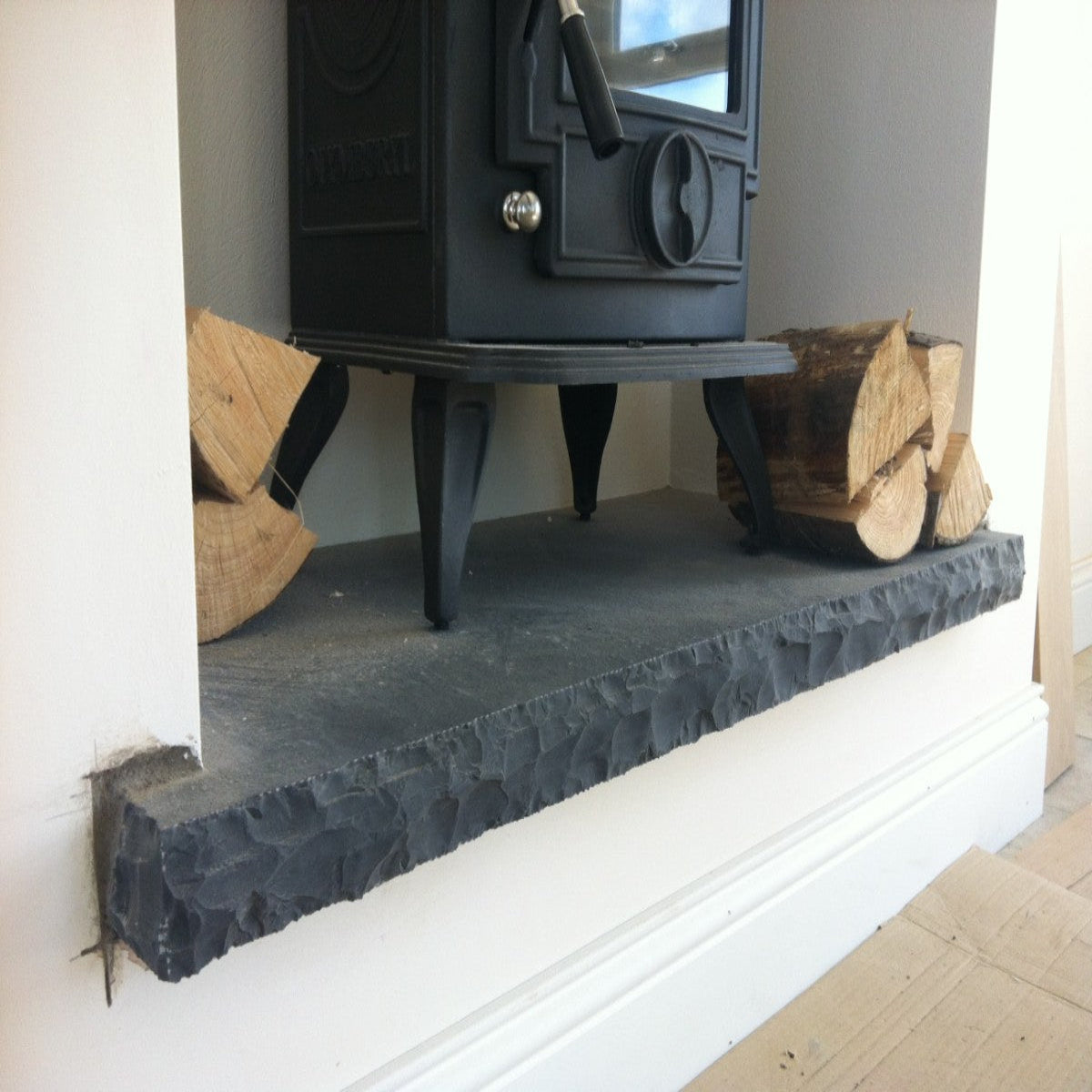 Black Limestone Hearth with Rockfaced Edge
