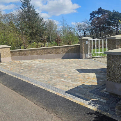 Donegal Quartzite paving entrance with border design completed using Black Limestone Cobbles 100 x 100mm.