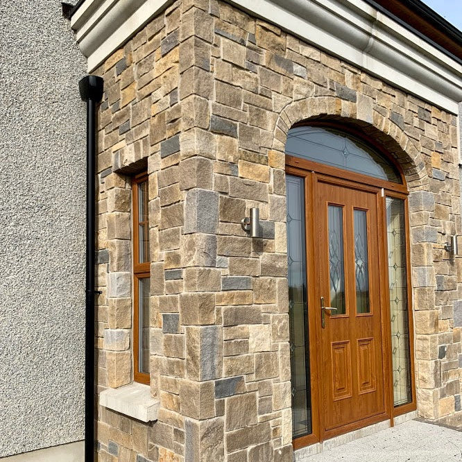 stone entrance completed in a mix of Blue Centre Sandstone & Mountcharles Sandstone Stoneer Cladding.