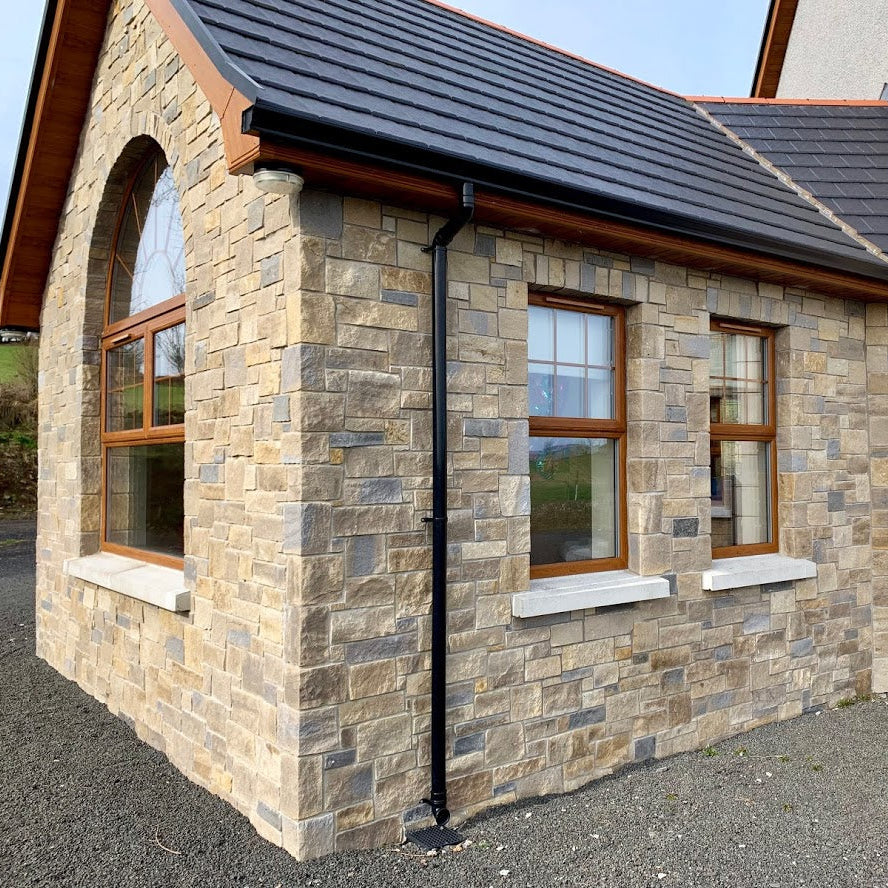 New build house with stone façade in a beautiful mix of Blue Centre Sandstone & Mountcharles Sandstone Stoneer Cladding. 