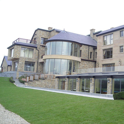 Contemporary building completed using Blue Centre Sandstone Machined and Architectural Sandstone Surrounds. 