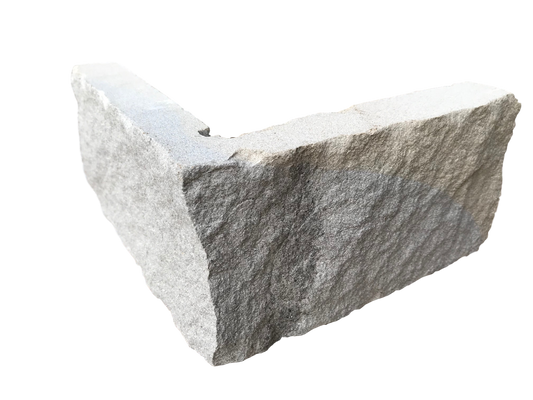 An L-shaped corner piece of Blue Centre Sandstone Stoneer, with a blend of blue and buff tones.