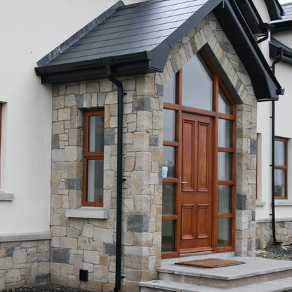 Stone porch cladded in sandstone mix featuring Blue Grey Sandstone Stoneer Cladding.  