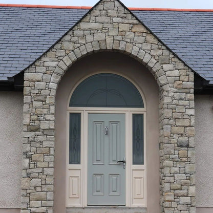 Stone clad entrance completed using Blue Grey Sandstone Stoneer Cladding. 