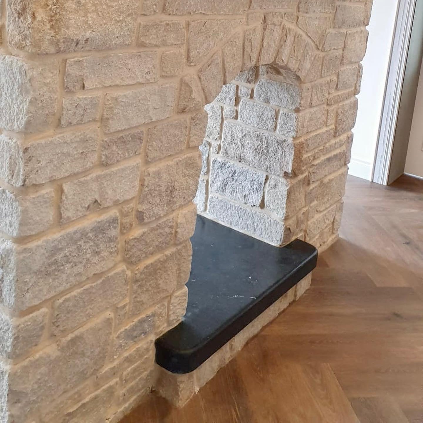 Bespoke Blue Limestone Hearth with a Sanded Finish and treated with PROTECTiT Colour Restorer. 