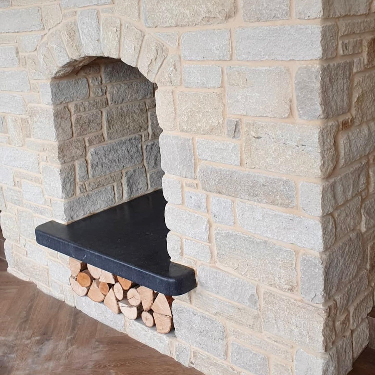 Bespoke Blue Limestone Hearth with a Sanded Finish and treated with PROTECTiT Colour Restorer. 