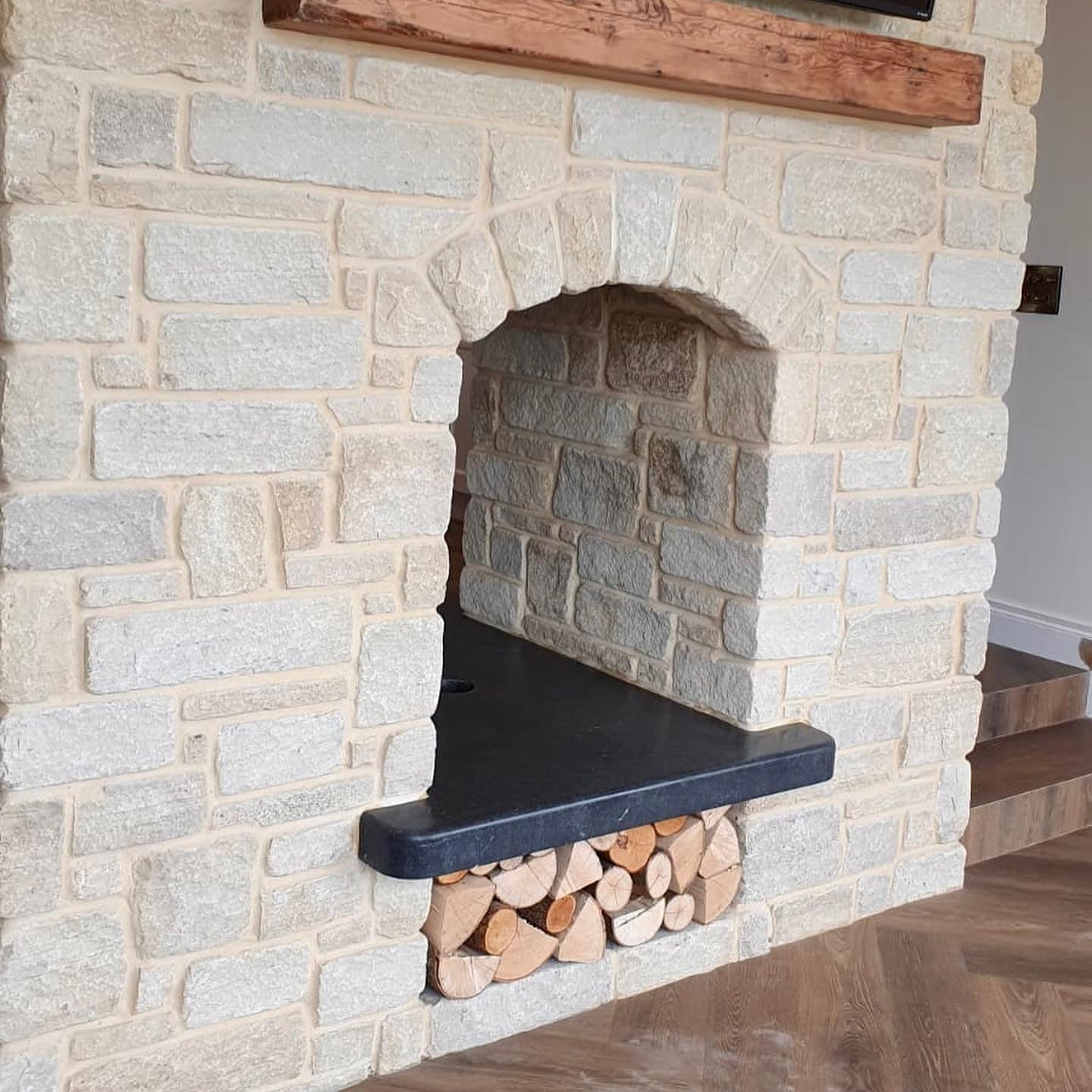 Bespoke Blue Limestone Hearth with a Sanded Finish and treated with PROTECTiT Colour Restorer. 