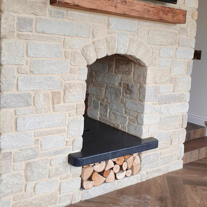 Bespoke Blue Limestone Hearth with a Sanded Finish and treated with PROTECTiT Colour Restorer. 