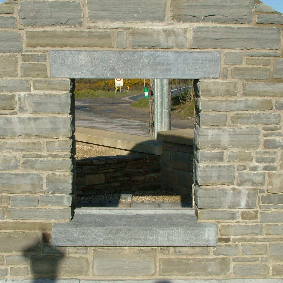 Display wall with blue limestone lintel and sill. 