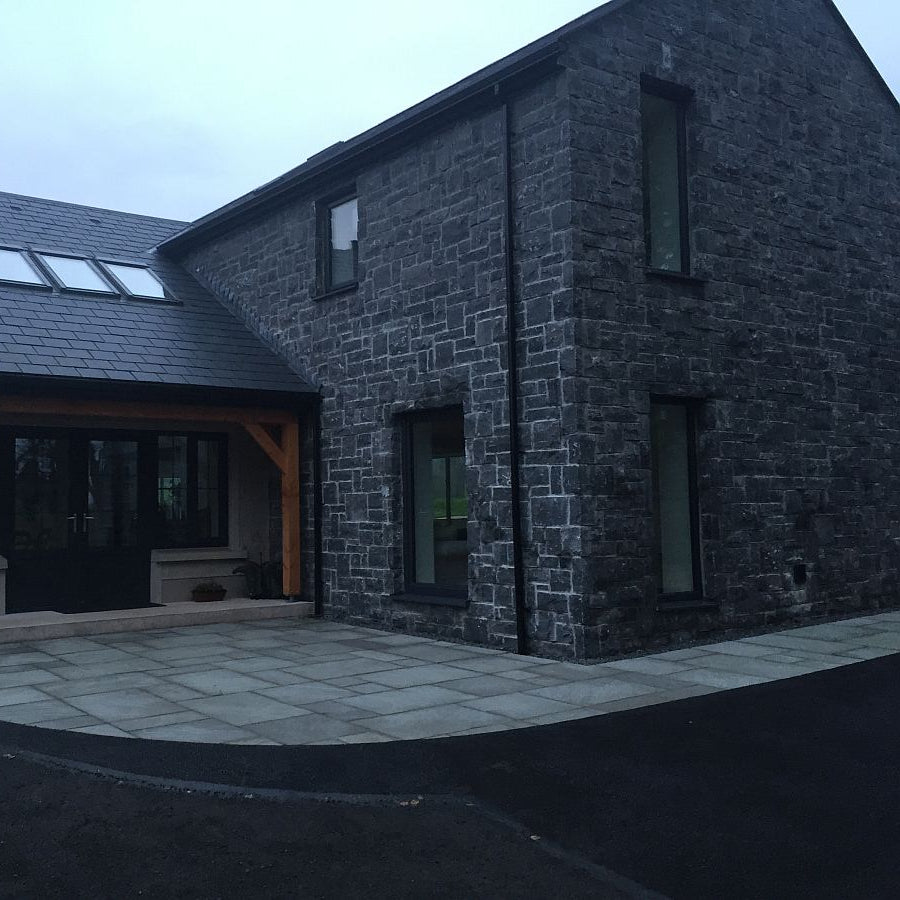 Modern style new build house completed Blue Limestone building stone. 