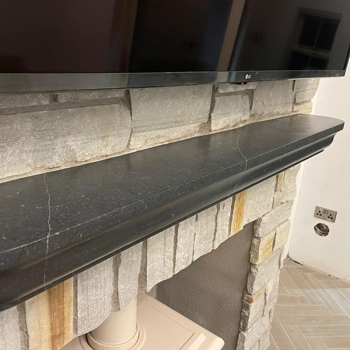 Bespoke Blue Limestone Mantel with a Sanded Finish and treated with PROTECTiT Colour Restorer. 