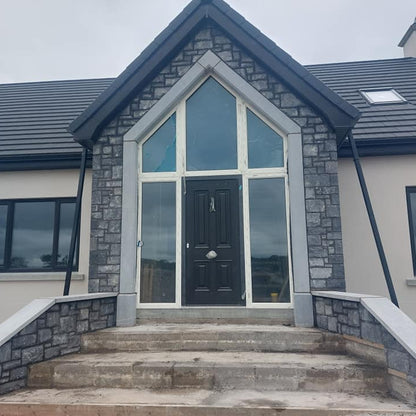 Entrance walls completed using Blue Limestone Stoneer Cladding and Bespoke Blue Limestone Surround. 