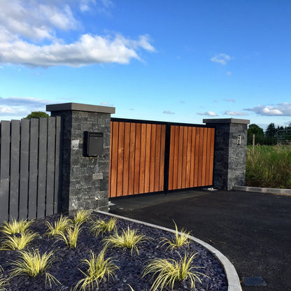 Entrance pillars completed using Blue Limestone Stoneer Cladding and bespoke Limestone pillar cap. 
