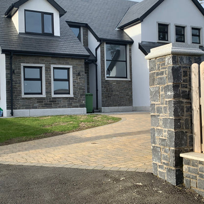 New build house with cladded feature walls in Blue Limestone Stoneer Cladding. 