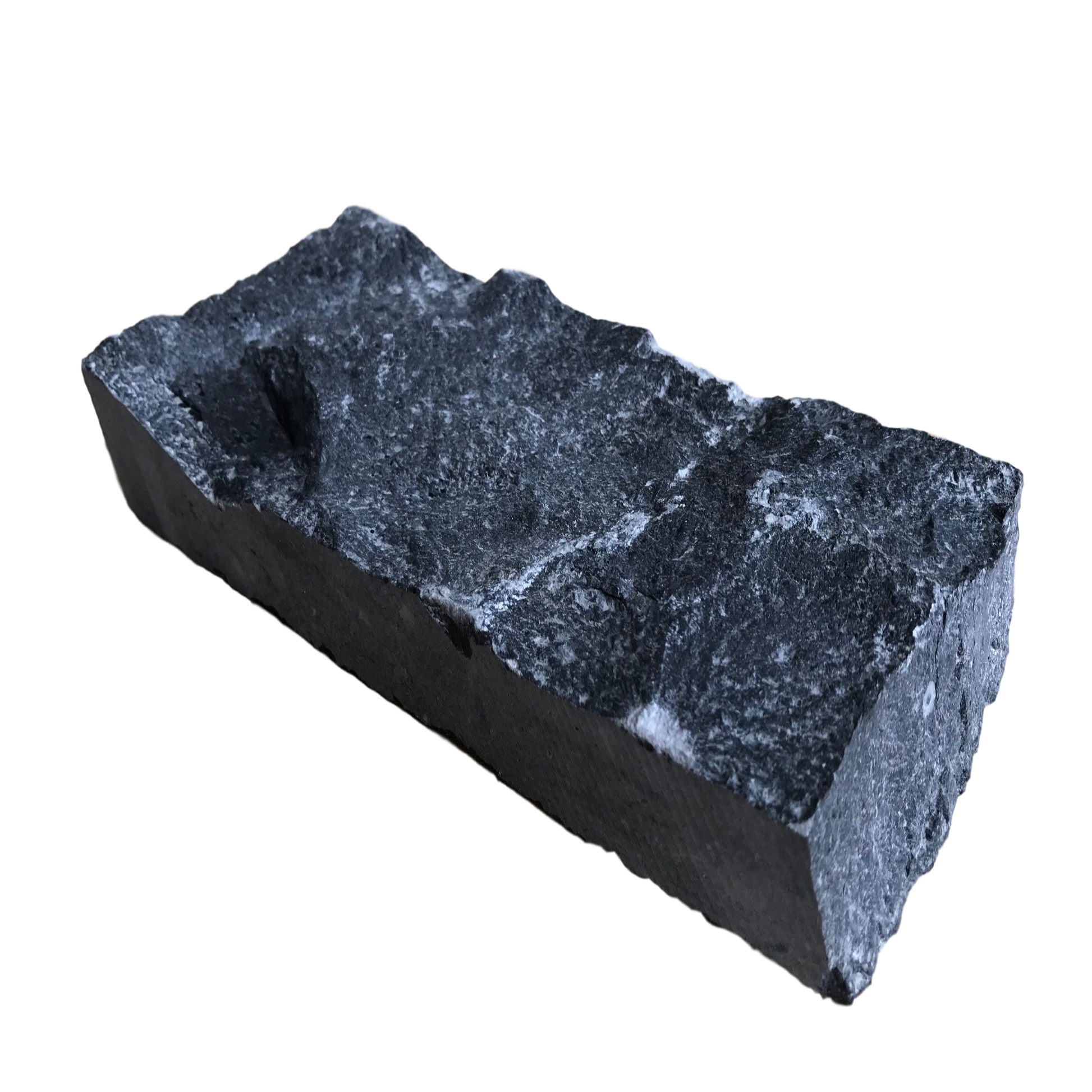 A flat piece of blue limestone stoneer cladding with a rough texture. 