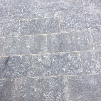 Blue Limestone Paving with a Flamed finish in 600 x 300 x 30mm size. 