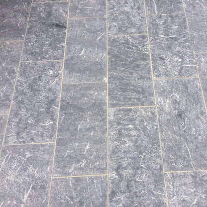 Blue Limestone Paving with a Flamed Finish in 600 x 300 x 30mm size.