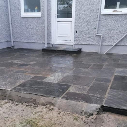 Small patio area and step completed using Cider Black Sandstone Paving.