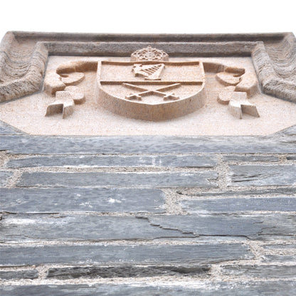 Bespoke Coat of arms in Clipsham Limestone embedded in a stone wall