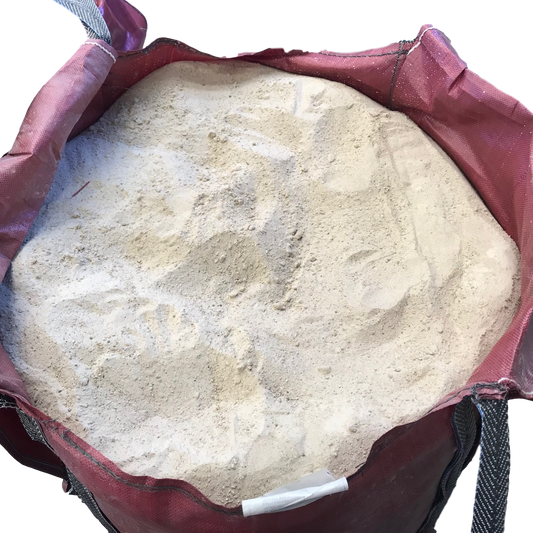 Concrete sand in McMonagle Stone bulk bag on a white background. 