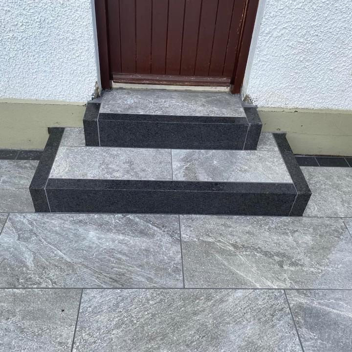 Steps completed using Dark Twice Qz Range Porcelain Paving Tiles. 