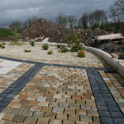 Pathway and patio design completed using Donegal Quartzite Cobbles in 100 x 100mm size. 