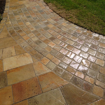 Pathway design featuring Donegal Quartzite Cobbles in 100 x 100mm size along with Donegal Quartzite Sawn Paving. 