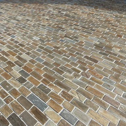 Close up of driveway completed using Donegal Quartzite Paving Setts in Random Length x 100mm size.