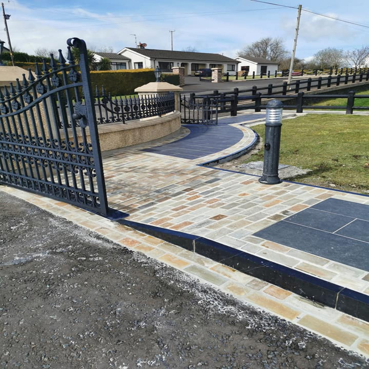 Pathway paved with Donegal Quartzite Paving Setts in Random Length x 100mm.