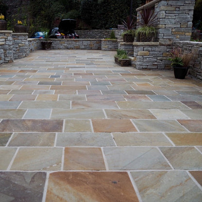 Hotel patio area finished with Donegal Quartzite Sawn Paving. 