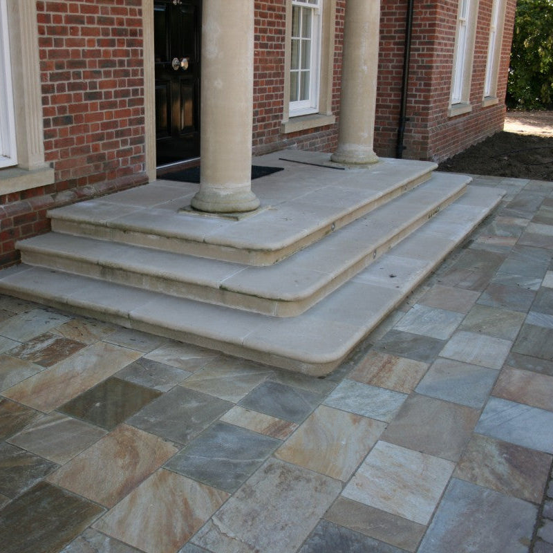 Grand entrance surrounded by Donegal Quartzite Sawn Paving. 