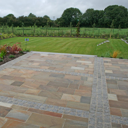 Large patio area and well maintained garden. Paving is Donegal Quartzite Sawn Paving and Silver Granite Cobbles in 100x100mm size. 